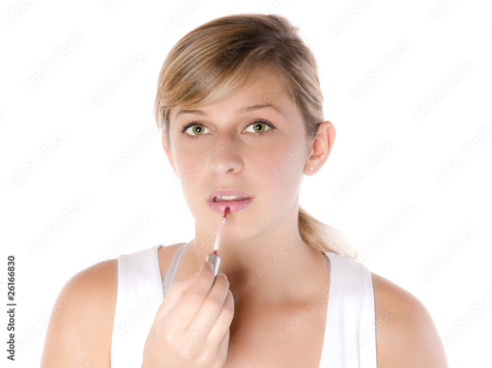 makeup - jolie femme aux yeux verts qui se maquille makeup - jolie femme aux yeux verts qui se maquille