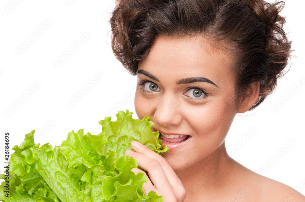 Closeup portrait of emotional beauty woman with green lettuce Closeup portrait of emotional beauty woman with green lettuce