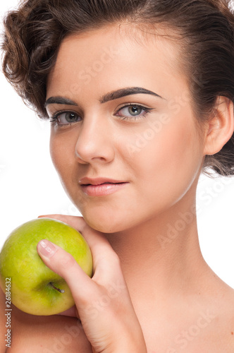 Closeup portrait of beauty woman with green apple