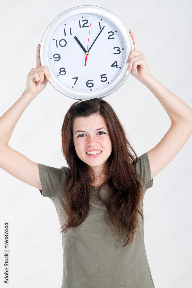 pretty teen girl holding clock pretty teen girl holding clock