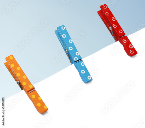 Colorful wooden pegs photo