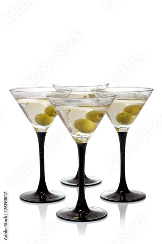 Martini with olives on a white background