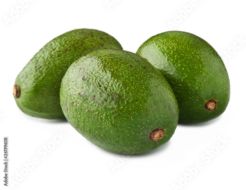 three green avocado closeup, isolated on white.