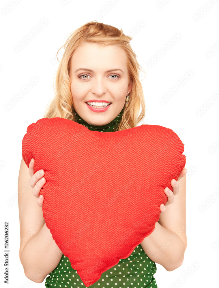 woman with red heart-shaped pillow woman with red heart-shaped pillow