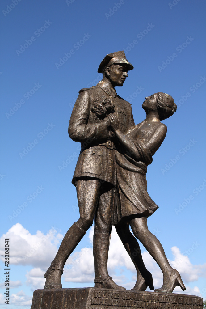 Poland - statue in Grudziadz, soldier dancing with a girl