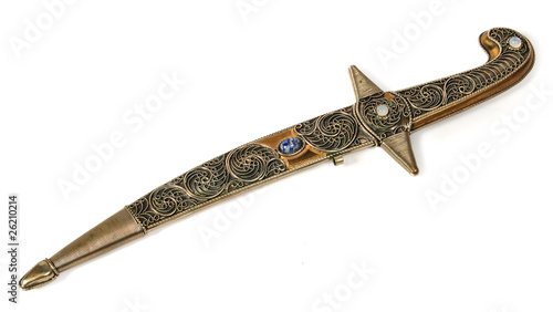 Fotografiet Silver a retro a dagger decorated with patterns and jewels