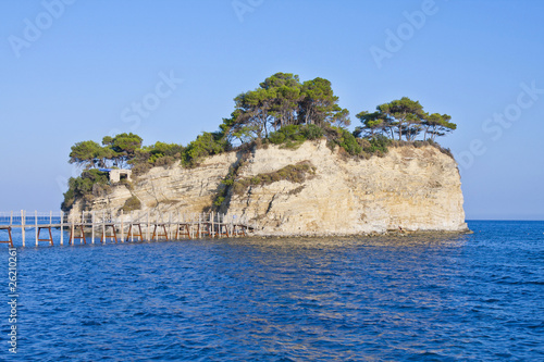 Small islet Agios Sostis connected with a bridge to Zakynthos is photo