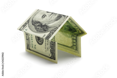Hundred US dollar note in shape of house