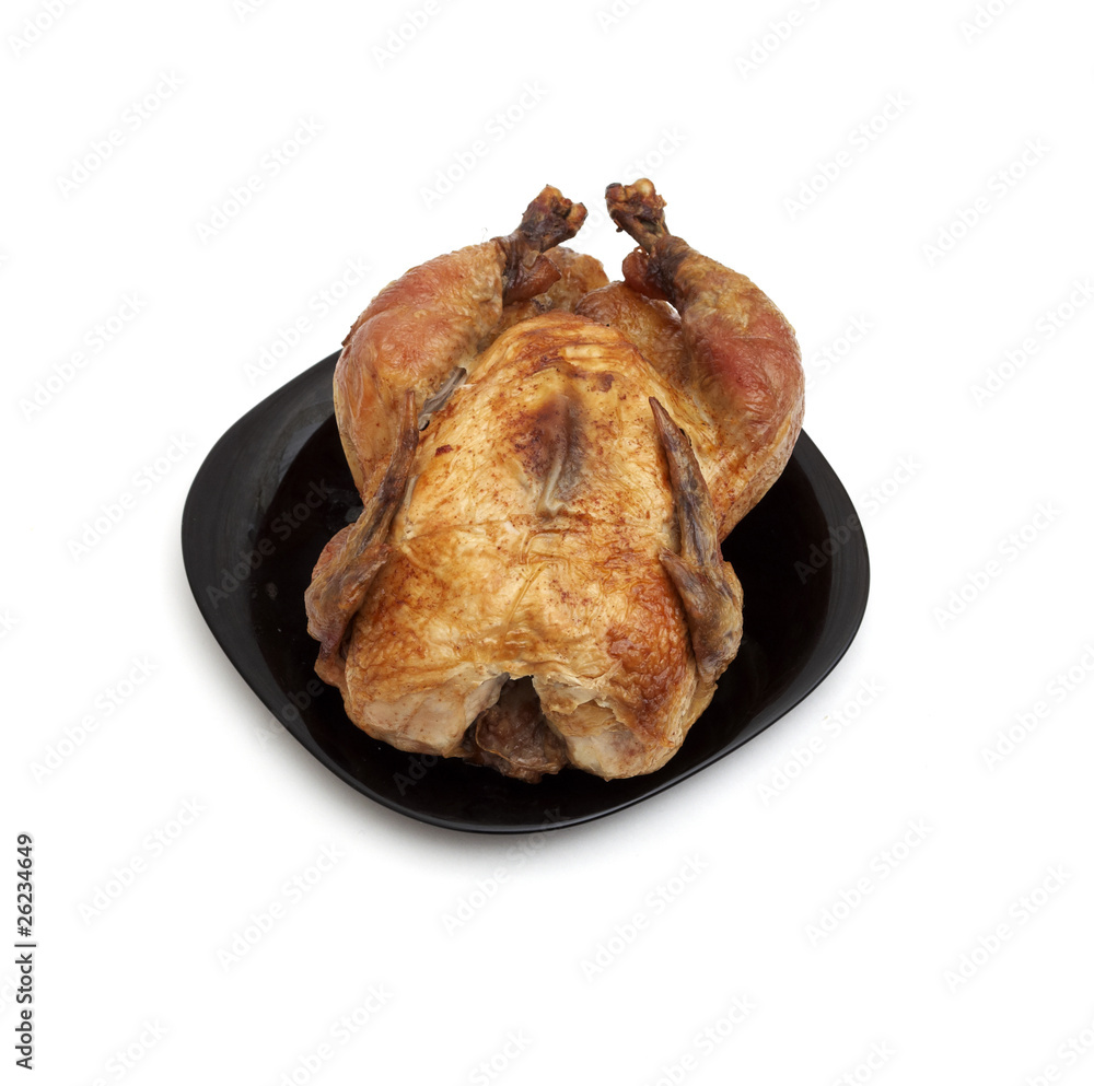 Tasty Crispy Roast Chicken on black plate . Tasty Crispy Roast Chicken on black plate .