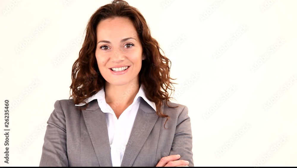 Businesswoman looking at camera with arms crossed Businesswoman looking at camera with arms crossed