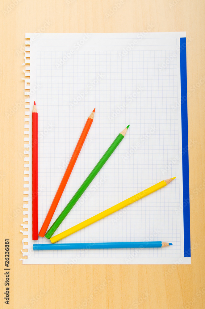 Binder and pencils isolated on the background Binder and pencils isolated on the background