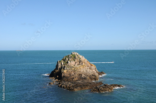 Rocky outcrop off the coast of Herm photo