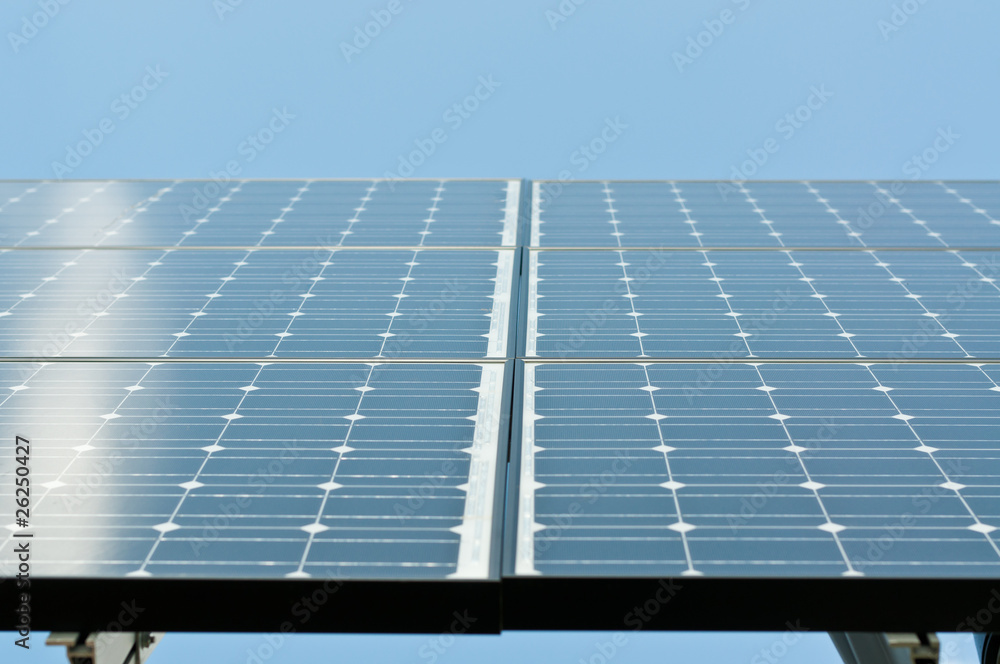 Obraz premium Sunlight Reflecting on Solar Panels