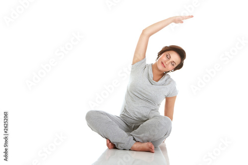 Pregnant woman practising aerobics