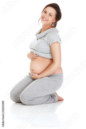 Pregnant woman practising aerobics