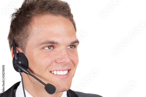 Smiling business man with headset. Over white background