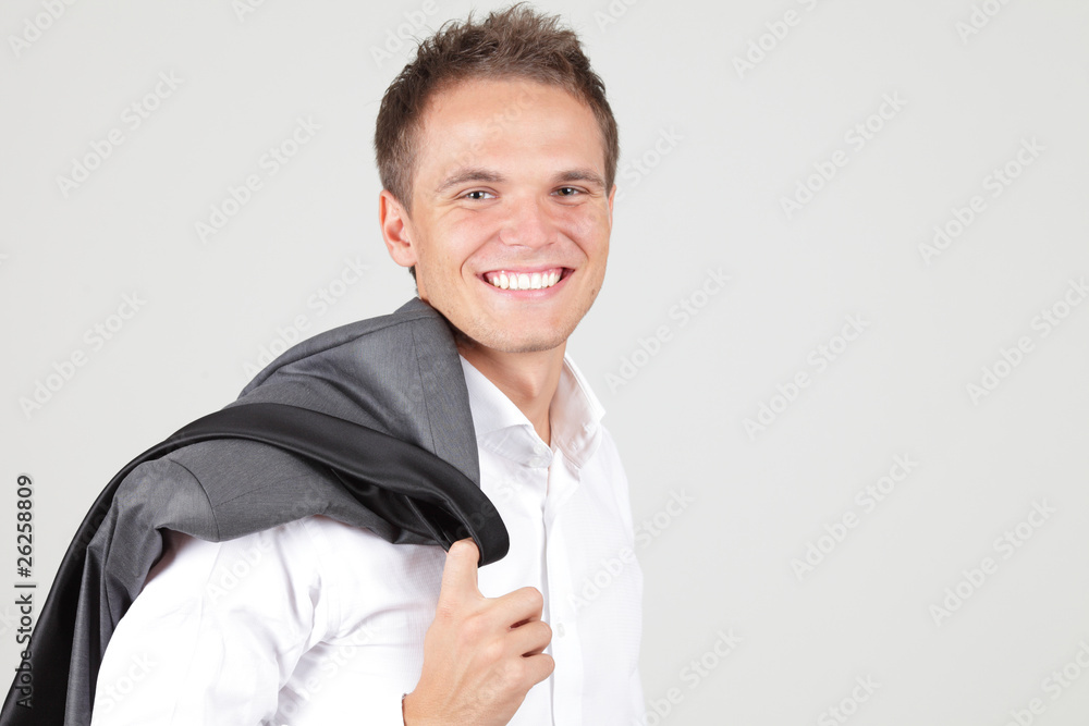 Positive businessman with jacket off over white background Positive businessman with jacket off over white background