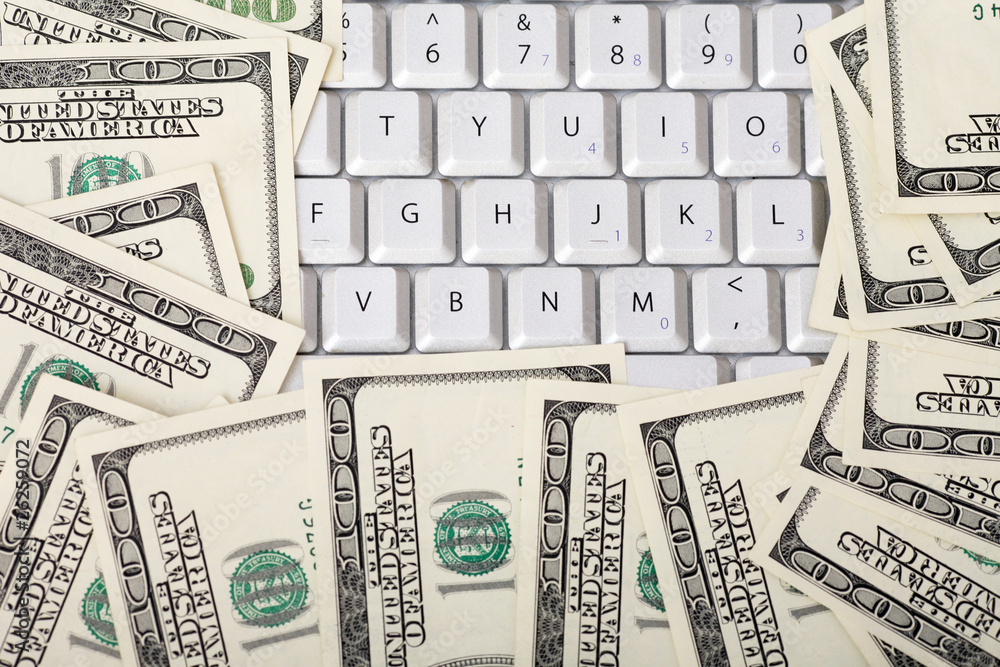 Keyboard with stack of money