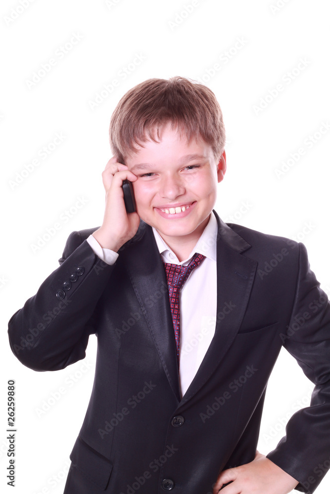 A small boy in the studio, pretending to be a businessman A small boy in the studio, pretending to be a businessman
