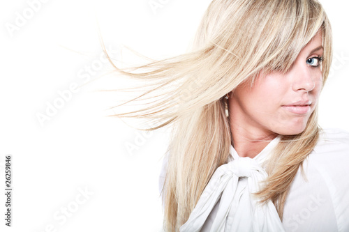Model posing on white and her hair flutter