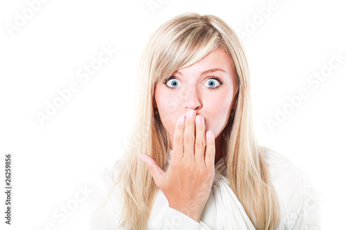Young beautiful woman looking surprised and shocked