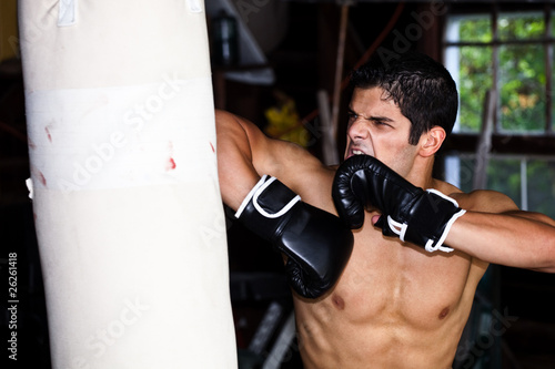 Fighter training in garage. © Nicholas Piccillo