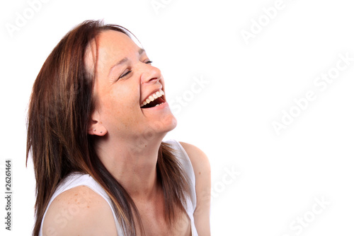 Pretty woman in her forties laughing