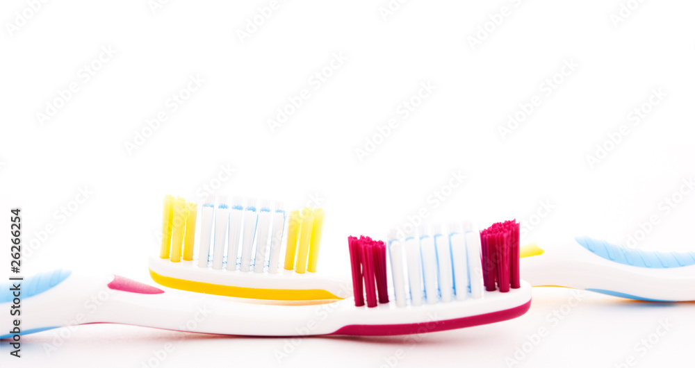 red and yellow toothbrush red and yellow toothbrush