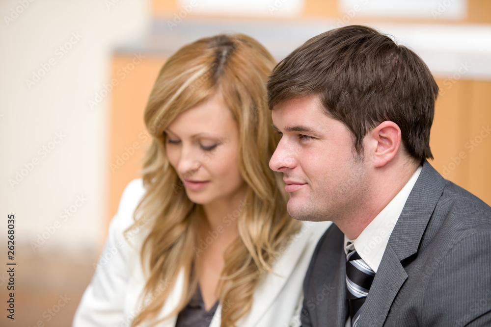 Two elegant businesspeople during a meeting Two elegant businesspeople during a meeting