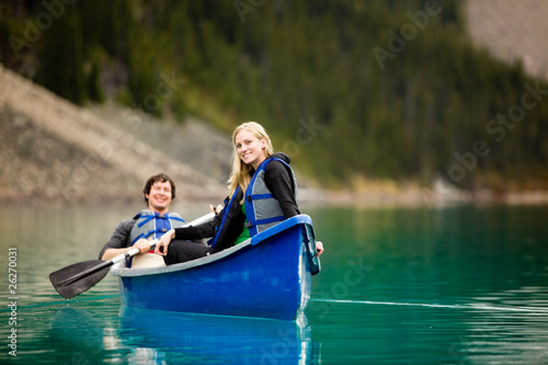 Couple Canoeing and Relaxing © Tyler Olson
