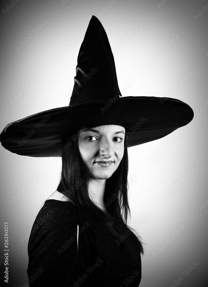 Young witch in black and white Young witch in black and white
