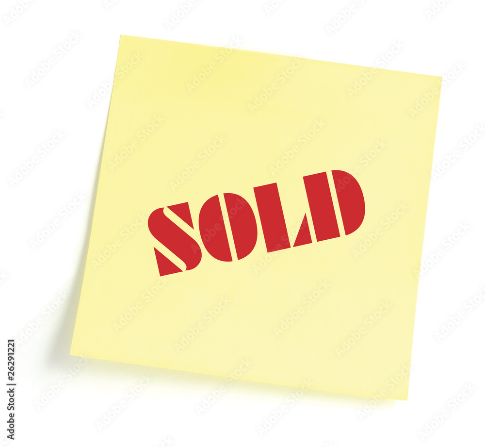 Yellow sticky note indicating item is sold, isolated Yellow sticky note indicating item is sold, isolated