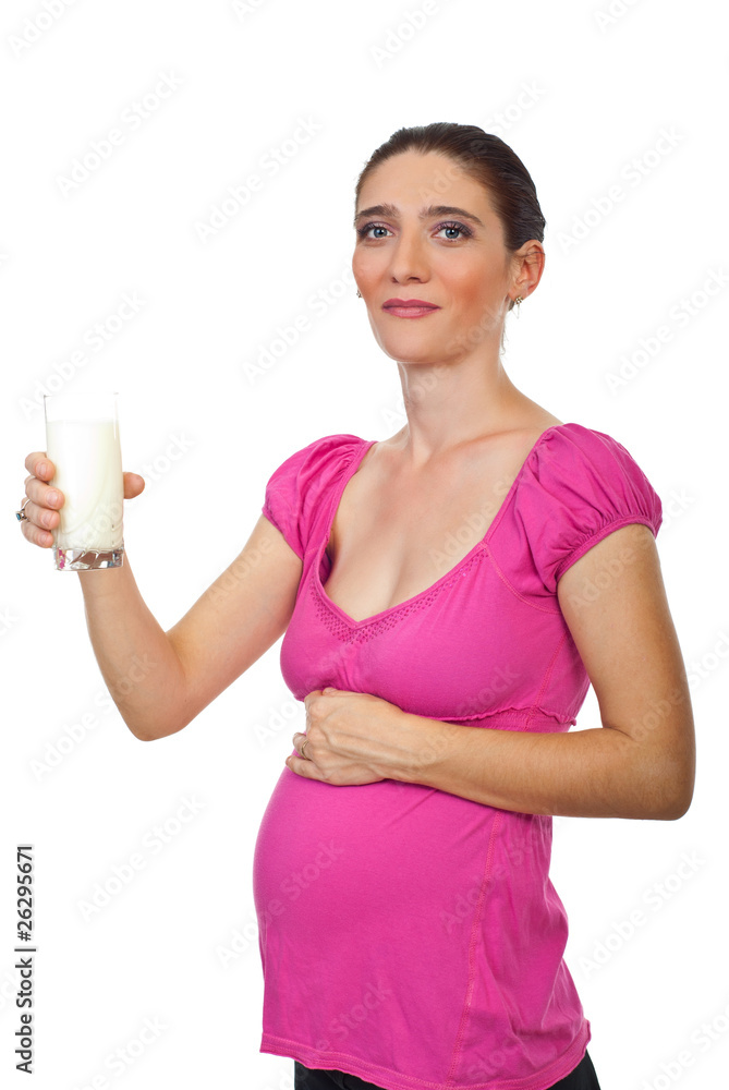 Pregnant woman holding glass with milk Pregnant woman holding glass with milk