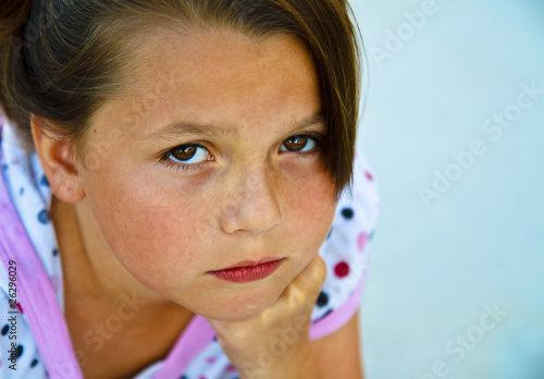 Photography Beautiful young girl on a concrete patio.