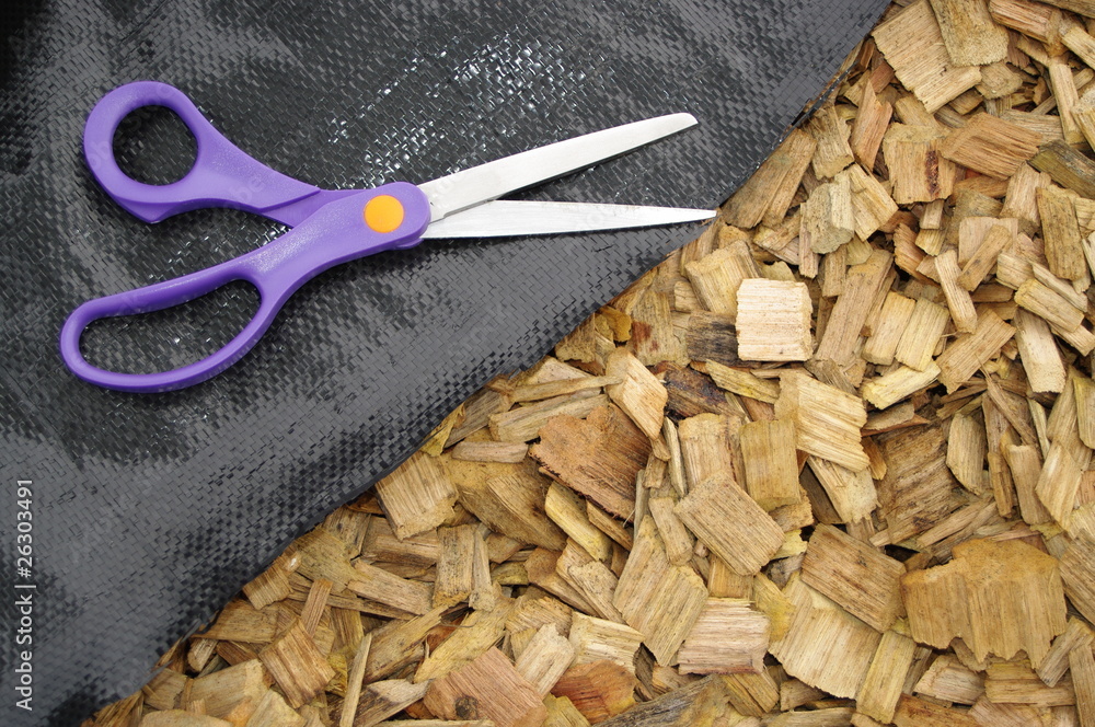 Obraz premium Mulch Scissors and weedmatt