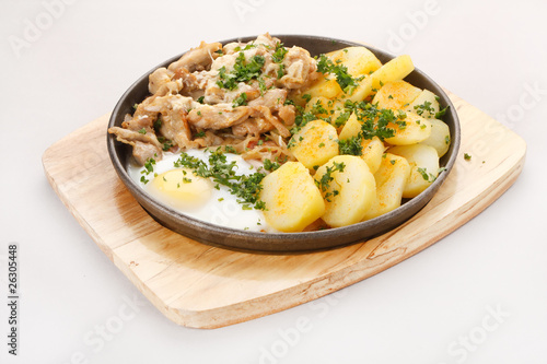 Meat plate with potatoes