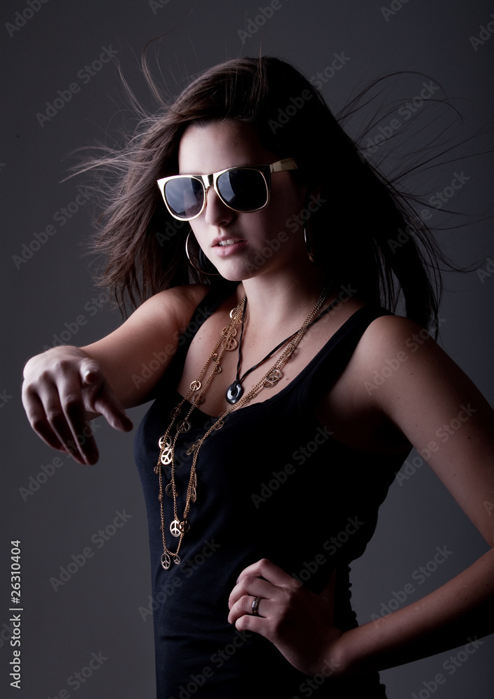 Teenage girl presenting with her hand. Teenage girl presenting with her hand.
