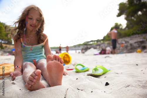 little girl at a beach. space for copy