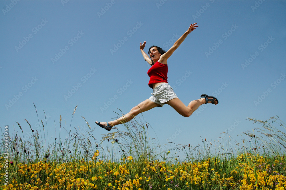 Beautiful young girl jumping
