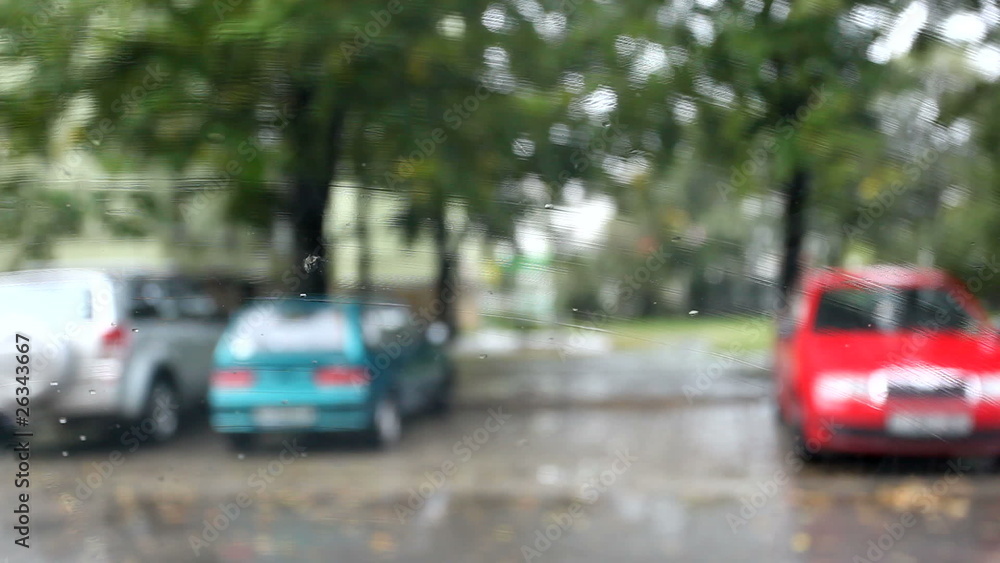 View through windshield with wiper working View through windshield with wiper working