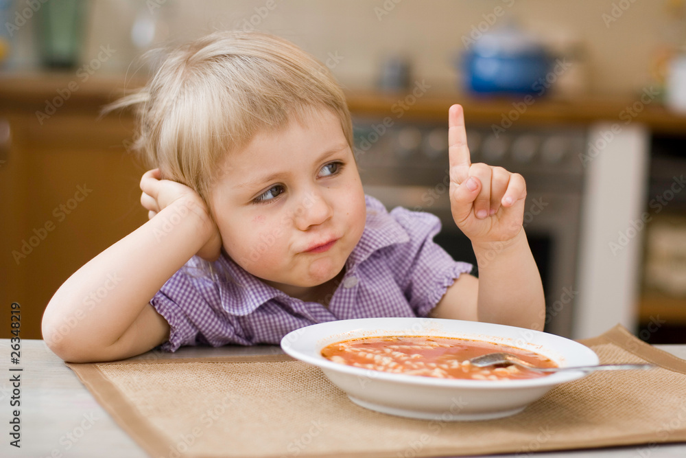 girl eating? soup - obrazy, fototapety, plakaty 