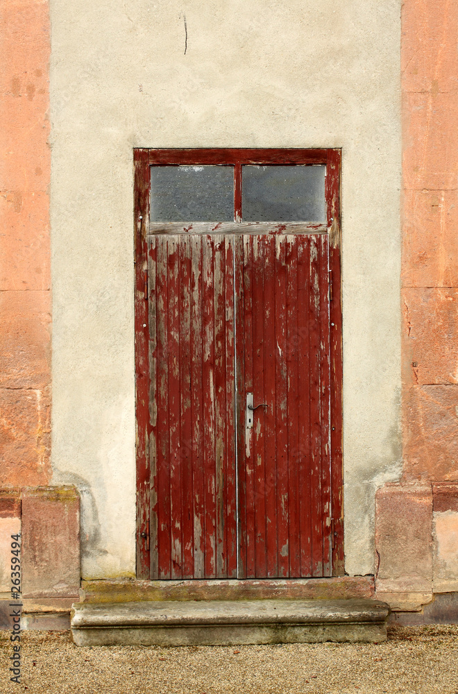 Fototapeta premium old wooden door and stone wall