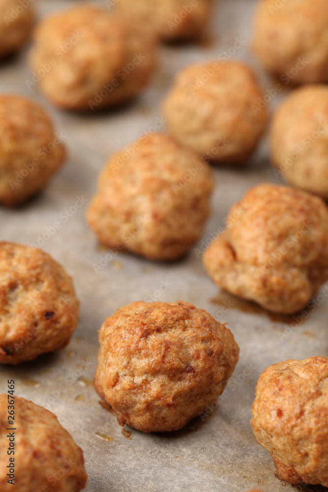 Roast meatballs on baking sheet. Shallow DOF Roast meatballs on baking sheet. Shallow DOF