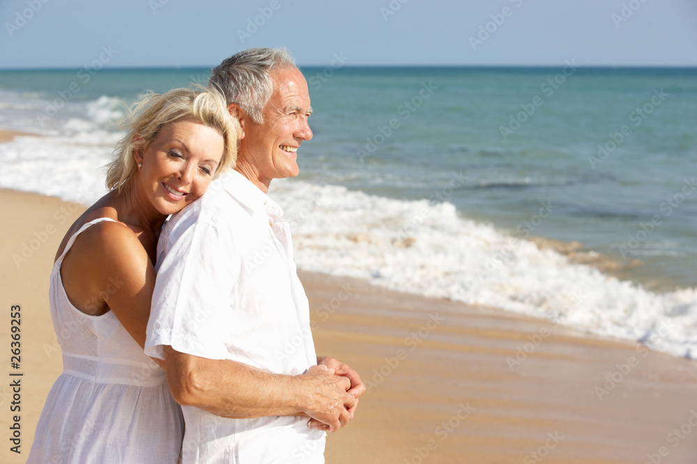 Senior Couple Enjoying Beach Holiday Senior Couple Enjoying Beach Holiday
