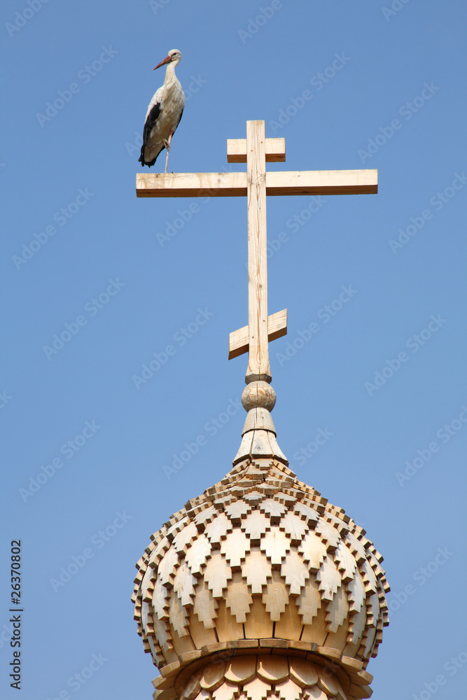 Stork wooden cross