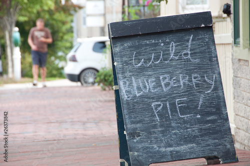 Chalkboard Sign Advertising Wild Blueberry Pie For Sale