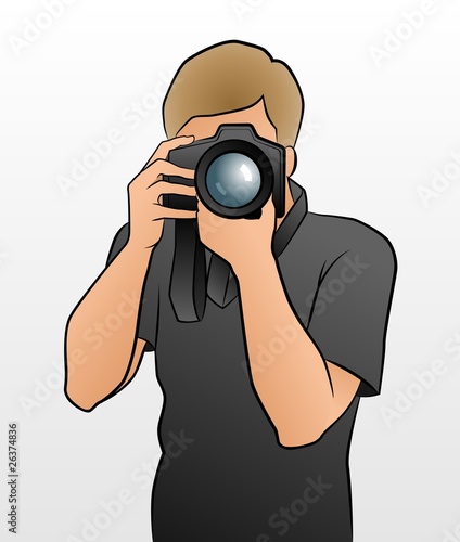 The Photographer. Young man taking a shoot with a camera