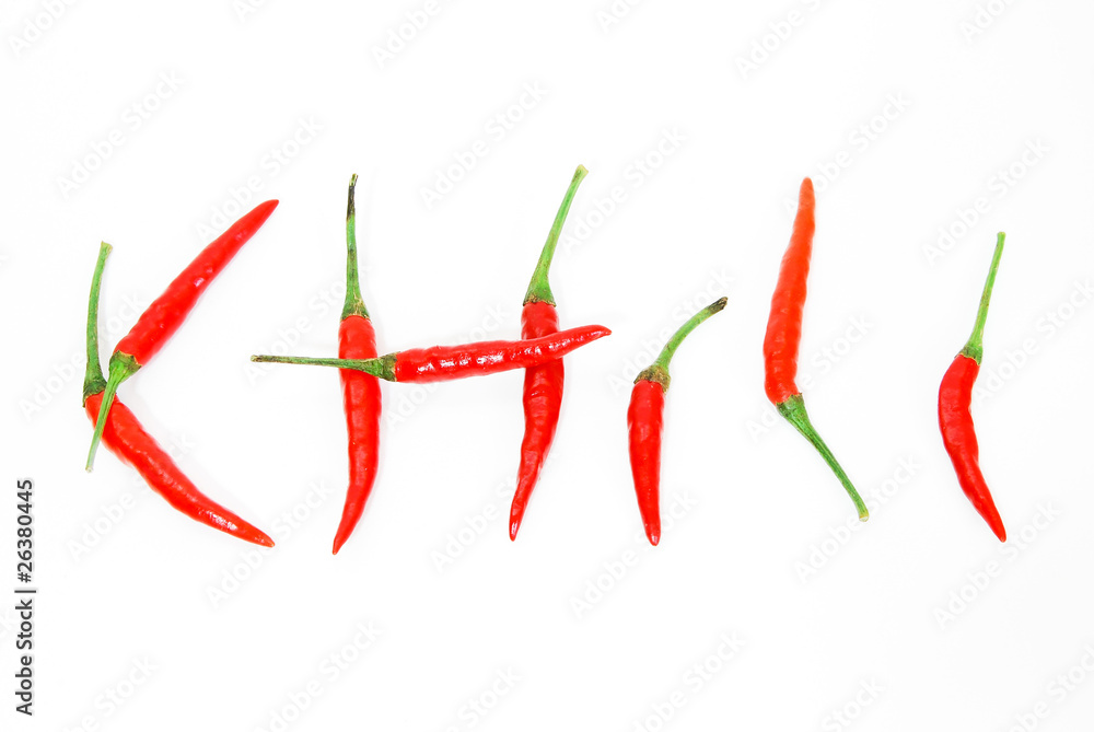 letter made from red hot chili peppers isolated on seamless whit letter made from red hot chili peppers isolated on seamless whit