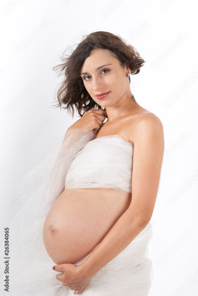 Beautiful young pregnant mother isolated on white Beautiful young pregnant mother isolated on white
