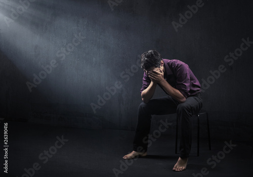 Sad man in a empty room